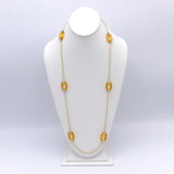 14K Gold and Carved Amber Glass Oval Link Necklace Kirsten's Corner
