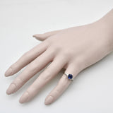 1950’s Sapphire and Tapered Baguette Diamond Platinum Ring Kirsten's Corner