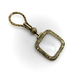 Georgian Pinchbeck Quizzing Glass with Floral Motif and Swivel Handle Pendant Kirsten's Corner