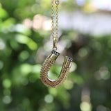 Victorian 14K Gold Intricate Woven Wirework Horseshoe Pendant with Diamonds