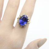 Vintage 14K Gold Tanzanite and Diamond Halo Ring by LeVian ring Kirsten's Corner Jewelry