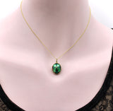 Gilt Silver Enameled Egg Locket with Hidden Cherub Pendant Kirsten's Corner