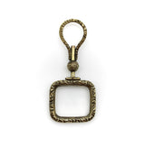 Georgian Pinchbeck Quizzing Glass with Floral Motif and Swivel Handle Pendant Kirsten's Corner 