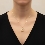 Victorian 14K Gold Intricate Woven Wirework Horseshoe Pendant with Diamonds