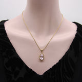 Vintage 14K Gold, Kunzite and Cognac Diamond Pendant Necklace Kirsten's Corner Jewelry 