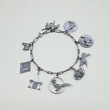 Edwardian Platinum Diamond Encrusted Fanciful Charm Bracelet